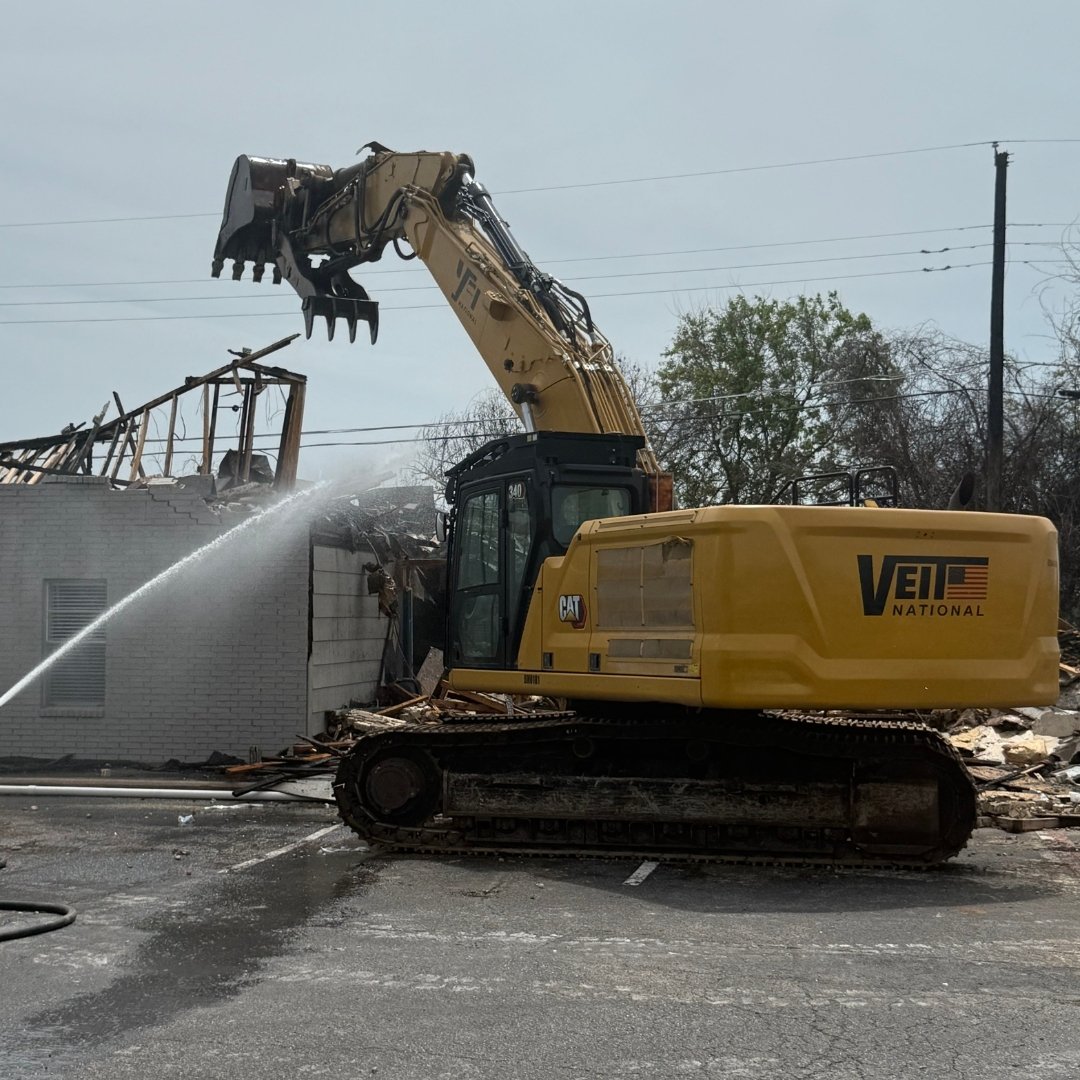 Image of equipment being used to complete demolition services at apartment complex in texas after fire damages