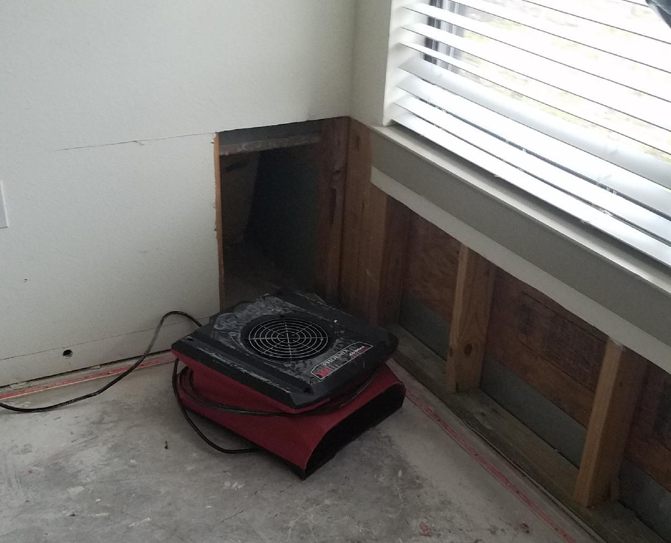 Drying equipment working to dry student housing property after flooding damage caused by deep freeze related pipe burst 
