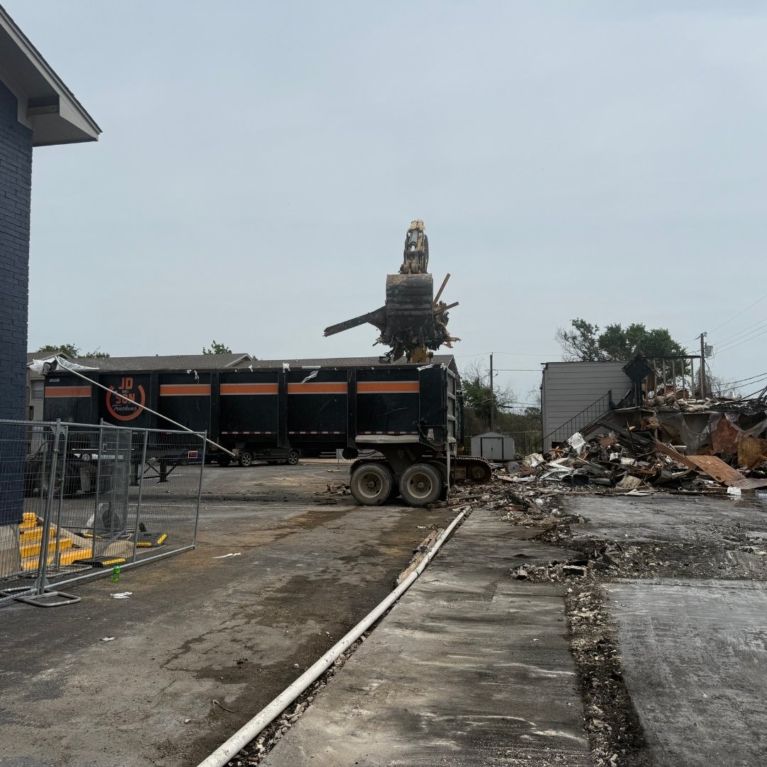Image of equipment used during demolition of fire damaged apartment building