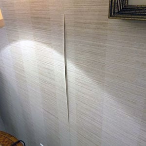 Wallpaper peeling from water damage