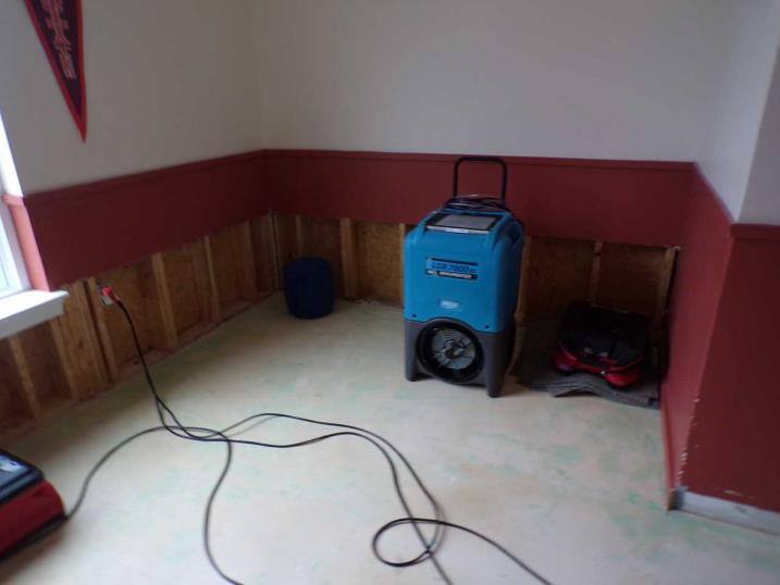 Student Housing Water Damage Reconstruction image of dehumidifier following initial reconstruction damage assessments before work begins