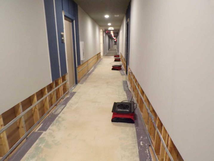 Student Housing Water Damage Reconstruction image of flooring damages before reconstruction processes begin