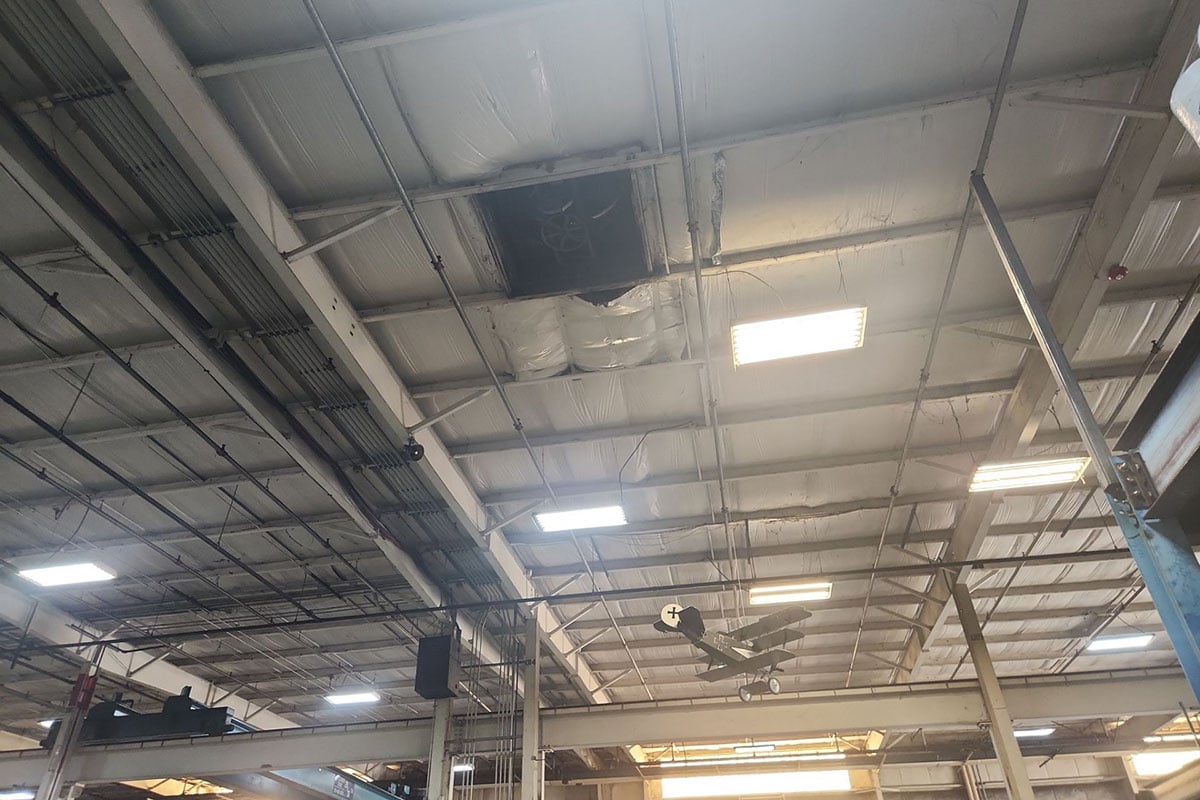 Ceiling of manufacturing plant damaged by hail
