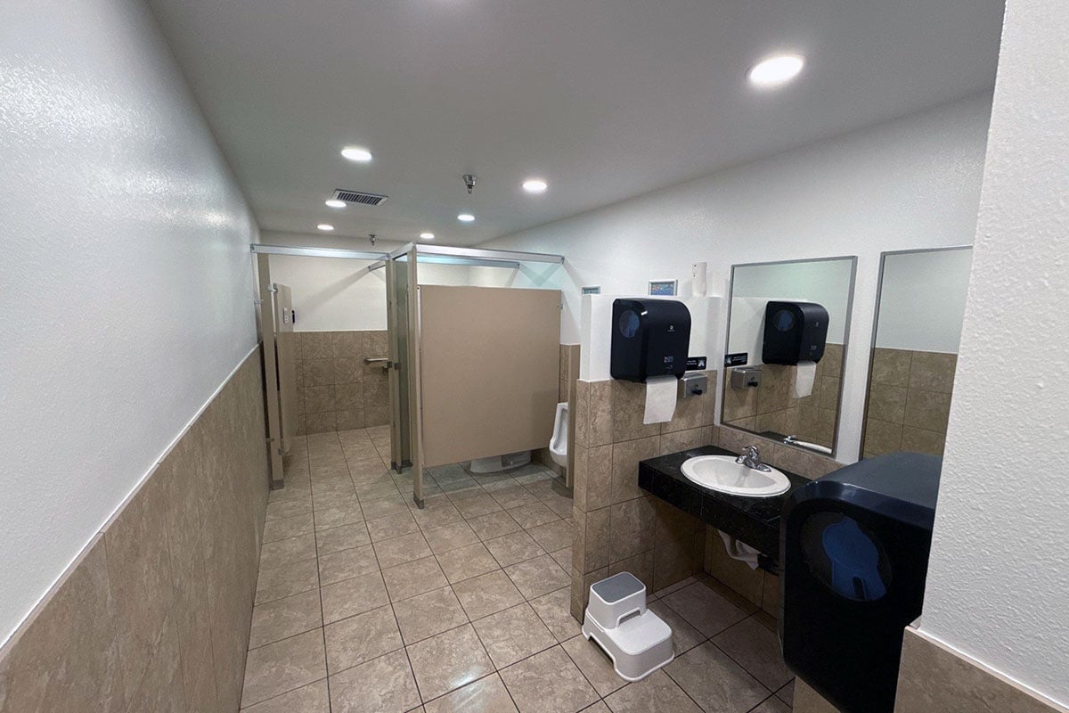 Bathroom of indoor play facility restored after fire damage.