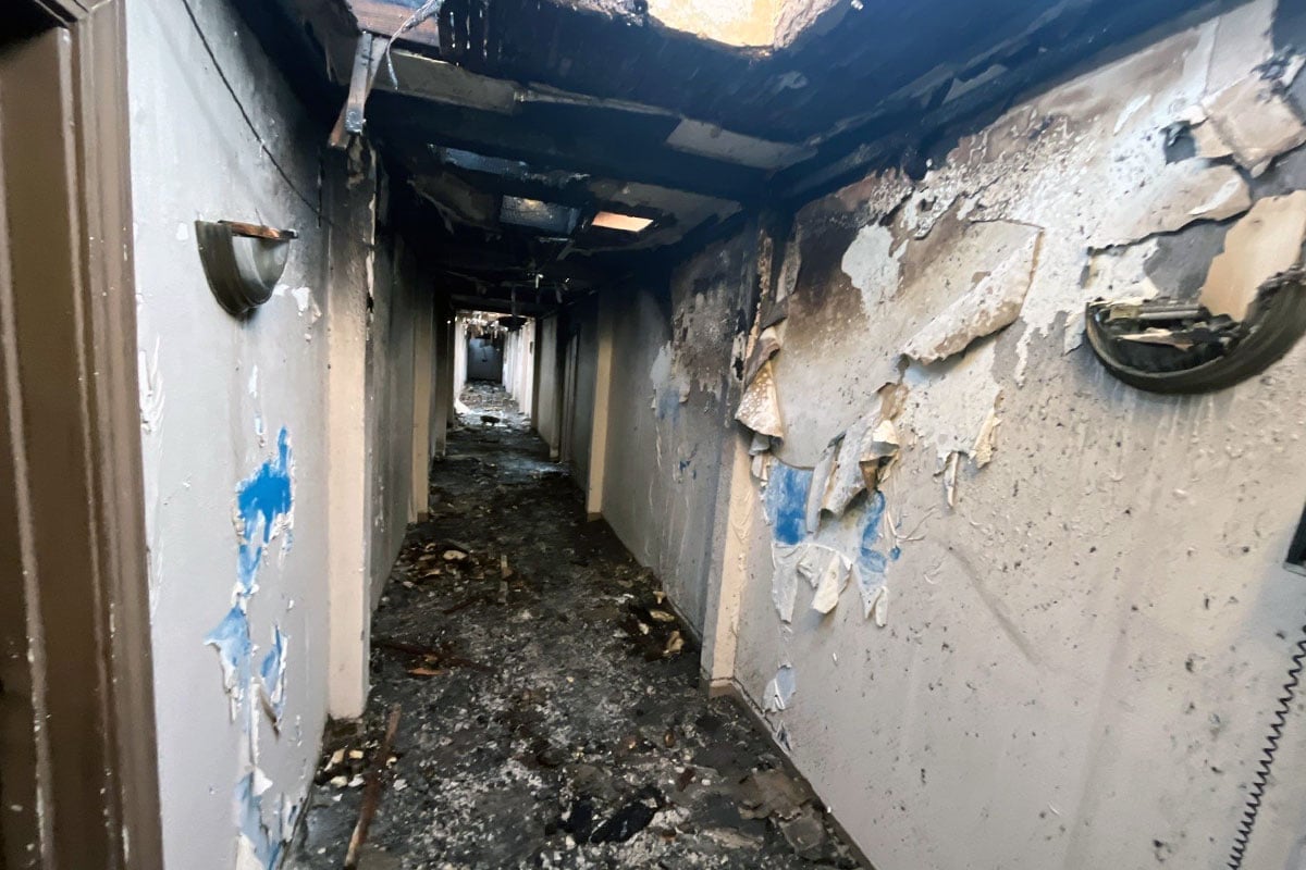 Hallway-damaged-by-fire-in-Manchester-Apts