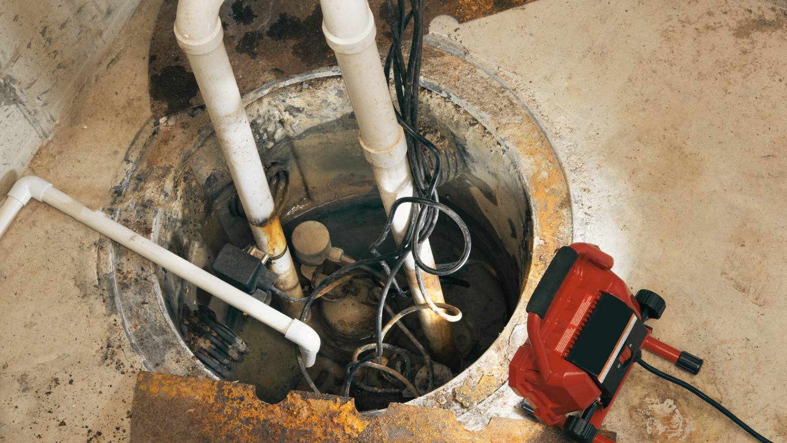 Repairing a Sump Pump in a Basement 